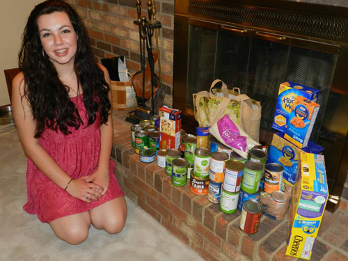 Kathryn Burress of Madeira with a few of her Sweet 16 birthday gifts for NEEDS.
